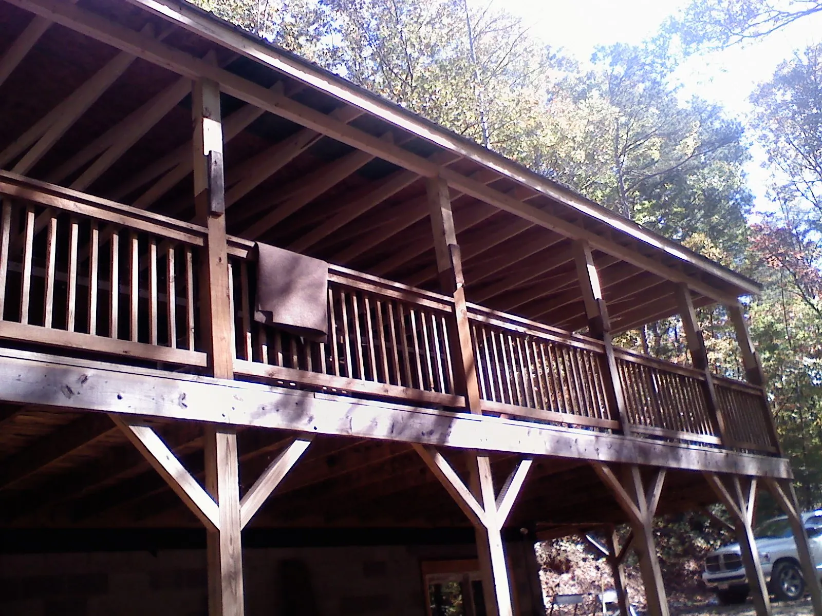 Timber framing under a new elevated porch and deck — Roof Leak Repair in Trumansburg by Roofing Brothers